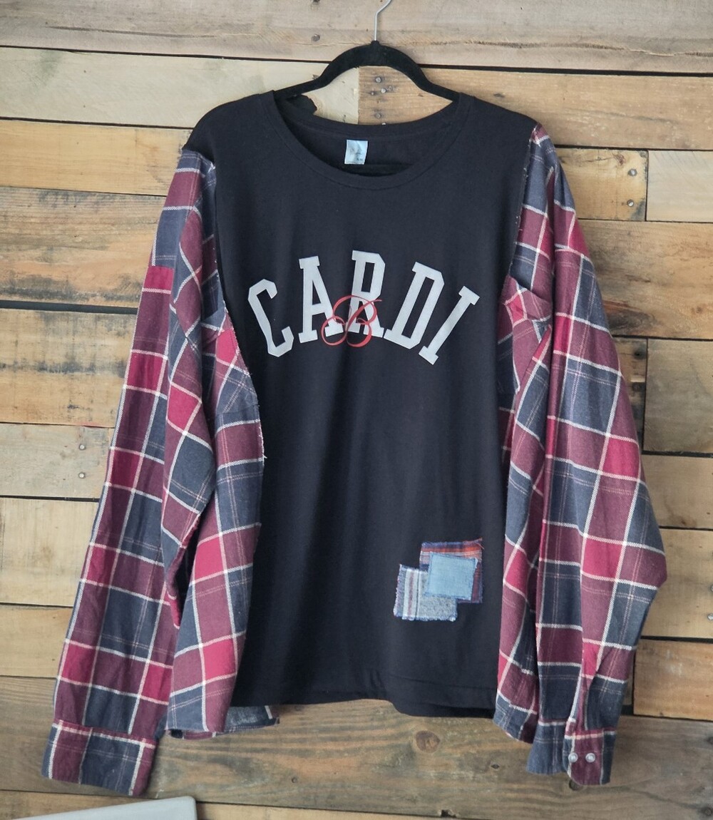 Cardi Graphic Black Shirt with Red Plaid Sleeves